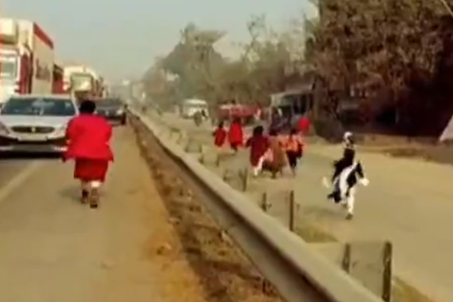 Screen grab of girls running in NH2 in Bihar
