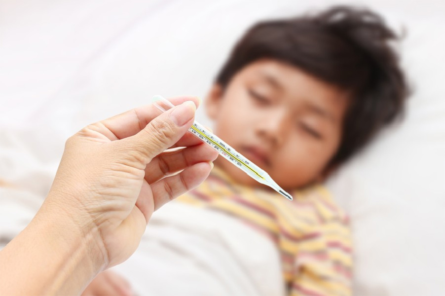 An image showing a child is suffering from fever  