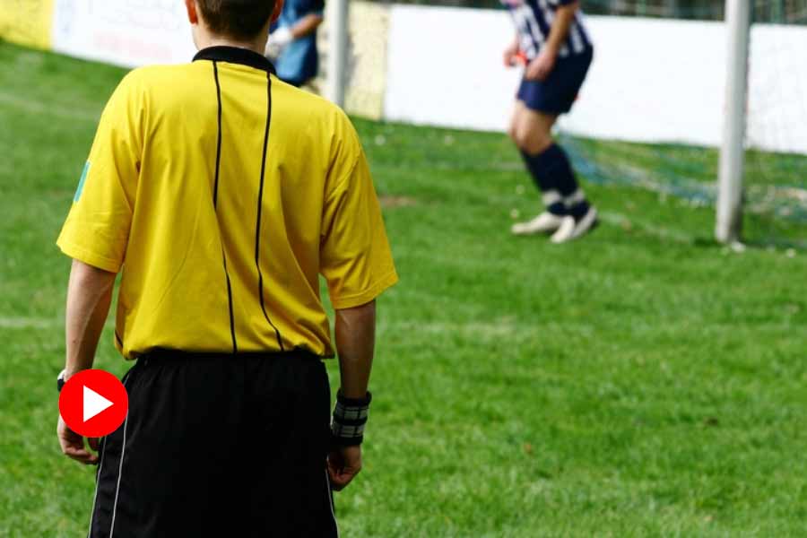 Picture of Referee in football ground