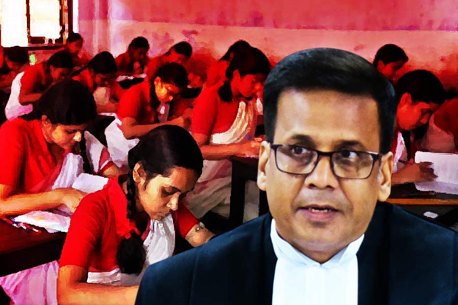 Calcutta High Court justice Biswajit Basu advises WB govt to reconsider Madhyamik Examination syllabus.