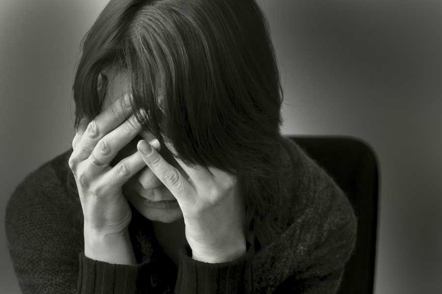Symbolic image of depressed woman 