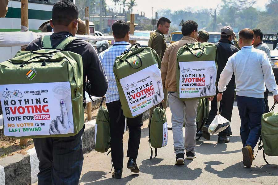 Polling officials on their way to respective polling stations.
