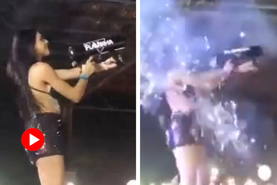 A DJ in Brazil blasts confetti canon on her face.