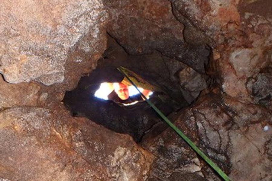 Kenny Veach trying to find the depth of M cave