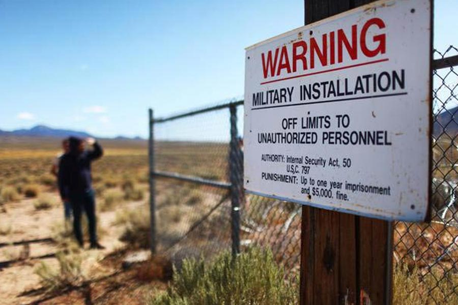 Warning sign of 'No civilians allowed' by Military