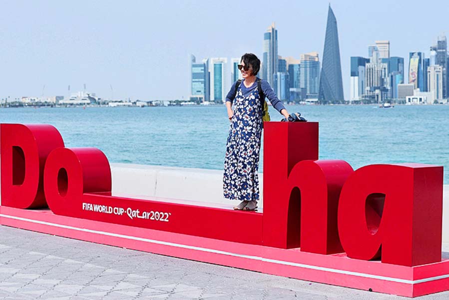 Tourist on Doha logo during world Cup 2022