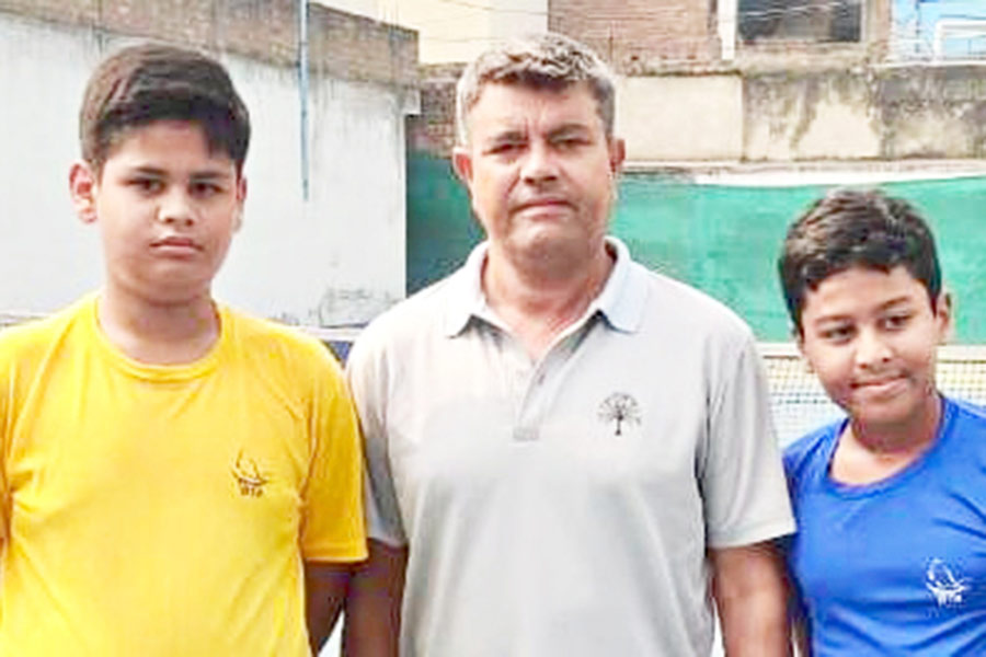 Two young talents in Tennis with their mentor