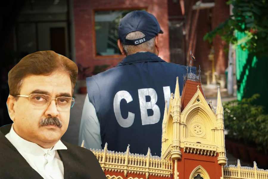 justice Abhijit Gangopadhayay of Calcutta High Court asks to remove A CBI Officer from  special investigation team of west bengal school recruitment scam  
