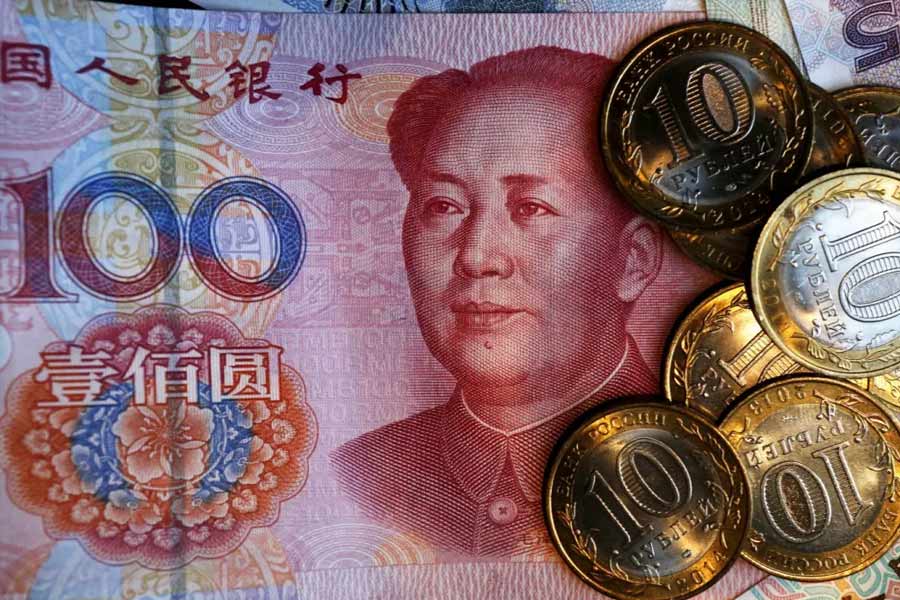 China is selling dollars offshore to save yuan