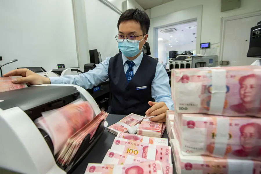 China is selling dollars offshore to save yuan