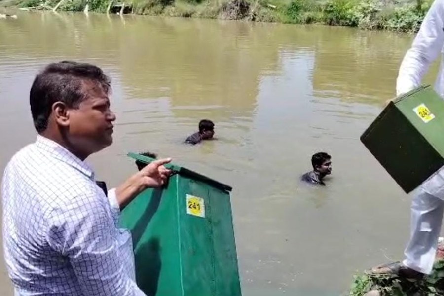 TMC Recovered ballot boxes from pond in Basanti