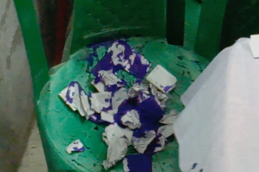 TMC candidate allegedly pours ink in the ballot paper in Cooch Behar.