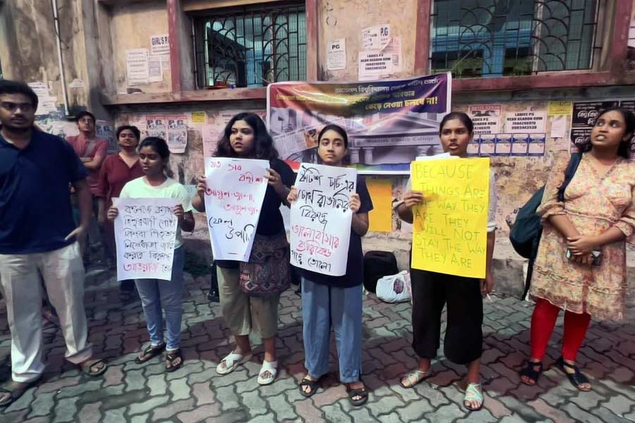 Students are protesting in front of Scottish Church College