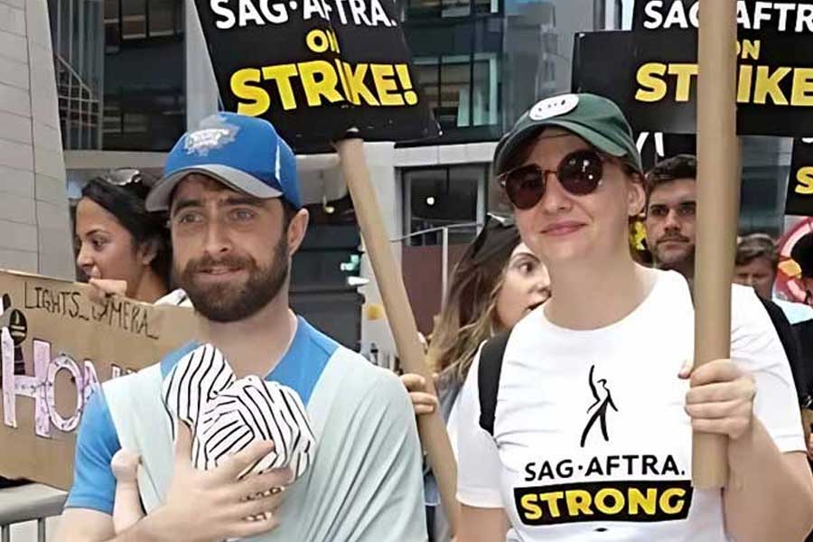 Daniel Radcliffe and Erin Darke take part in Hollywood Strike