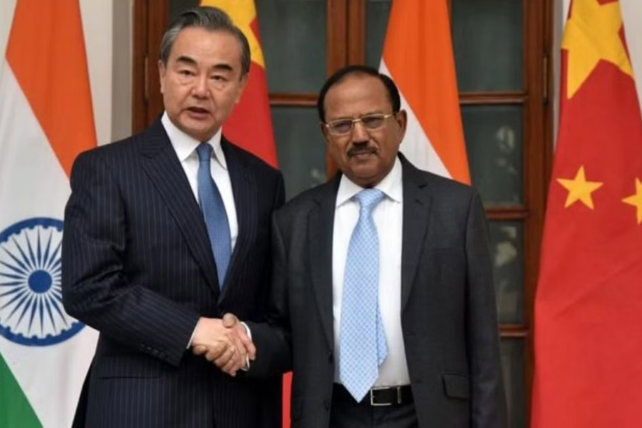 An image of Wang Yi and Ajit Doval