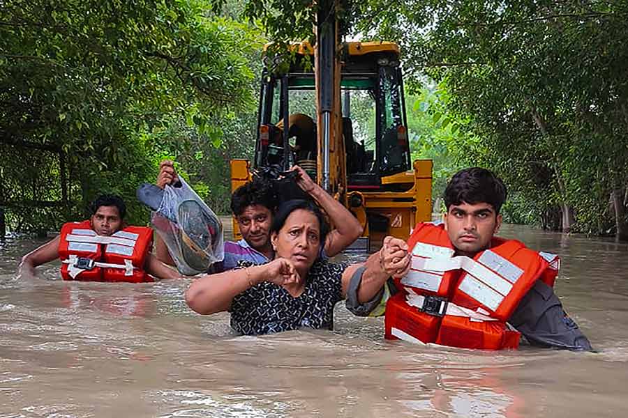 Image of floodhit people in delhi NCR