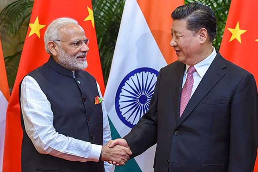 image of xi xi jinping and PM Modi 