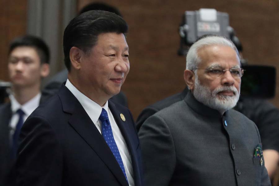 image of xi jinping and PM Narendra modi 