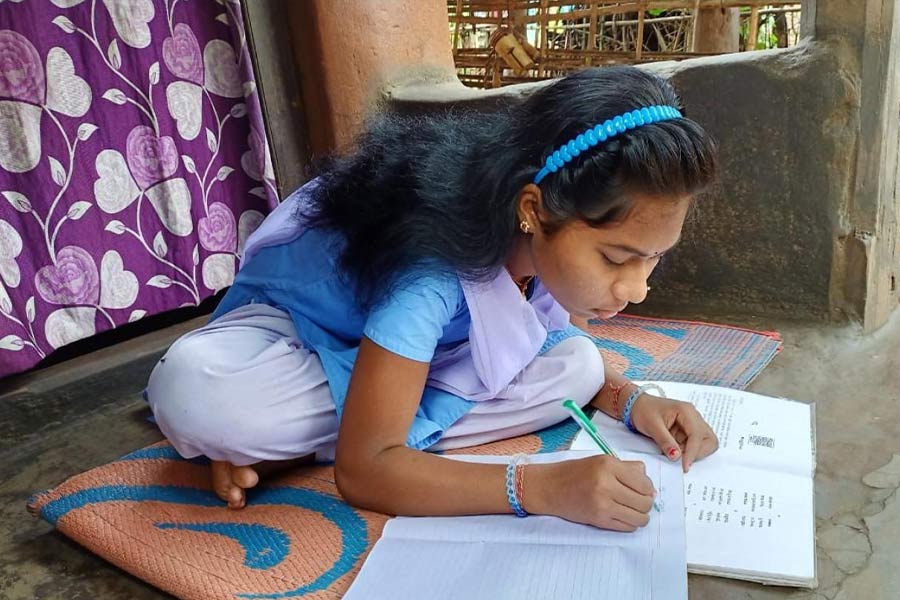 Image of district topper tribal girl.