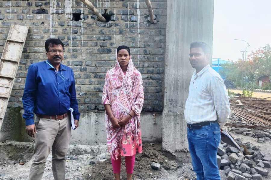 Image of Govt. Official with topper girl.