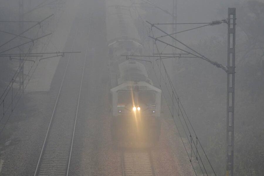 Image of train passing thorough in foggy weather