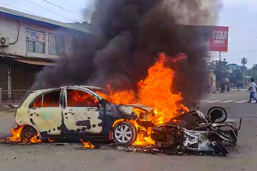 Image of car burning in capital imphal