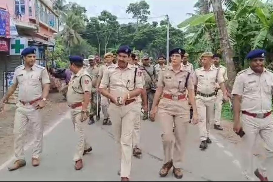 Police marching in Bhangar after TMC and ISF clash