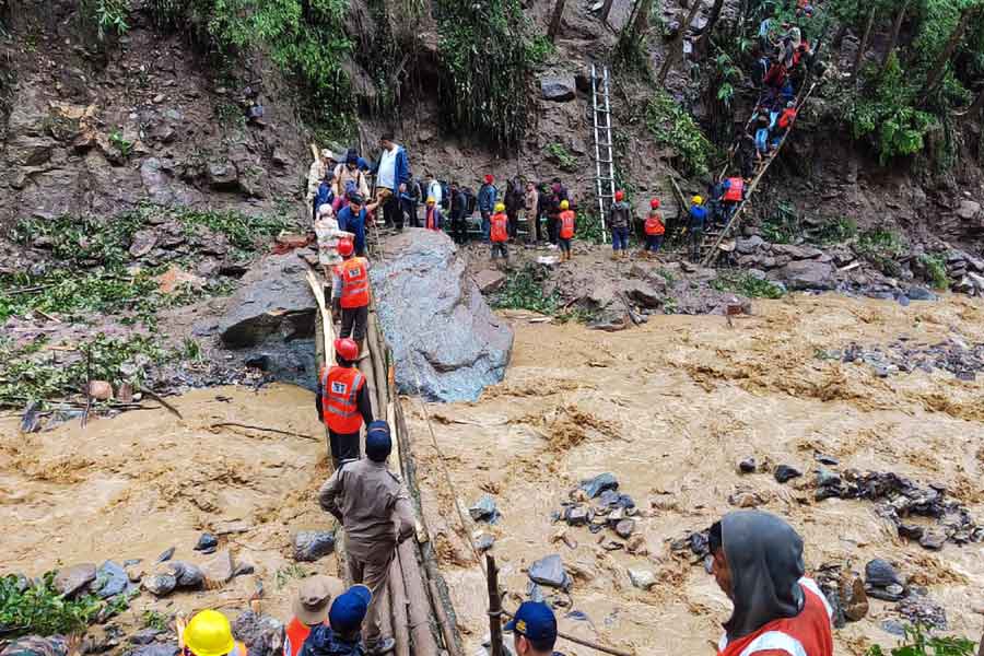Many people are stranded in Sikkim as cars stuck on roads after landslide.