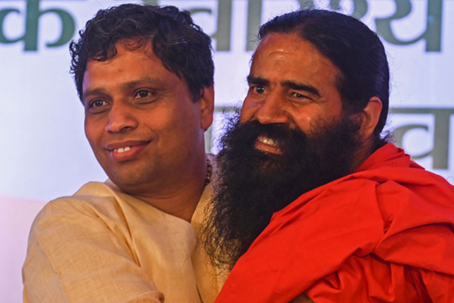 image of Acharya Balkrishna and ramdev 