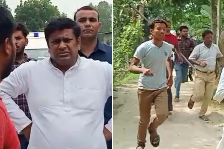 BJP State President Sukanta Majumder chases some men who allegedly threat BJP Candidate