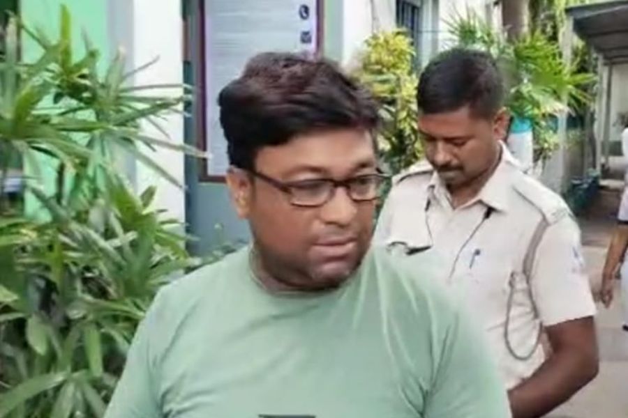 arrested TMC Worker