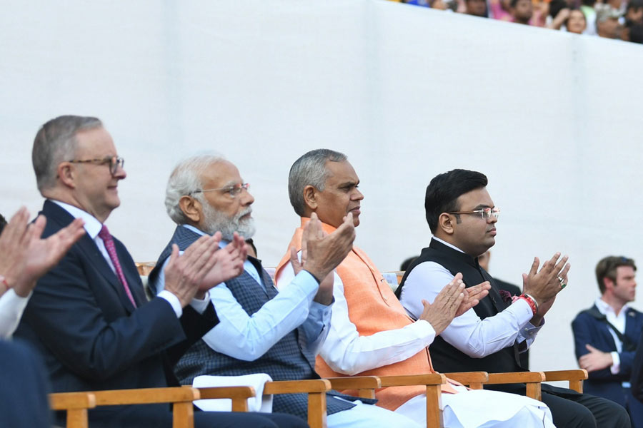 Picture of Pm Narendra Modi and Joy Shah and other people.