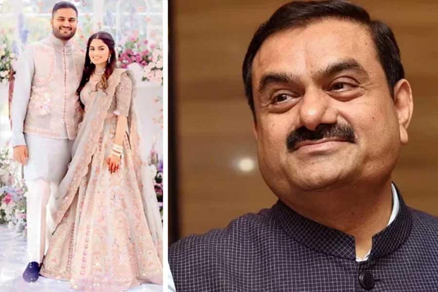 image of gautam adani and his son 