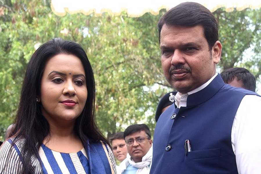 A Designer from Mumbai booked for trying to bribe Maharashtra deputy CM Devendra Fadnavis wife Amruta with Rs 1 crore