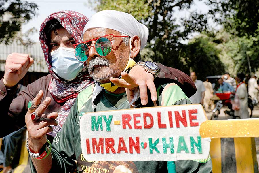 A Photograph of people with placards 