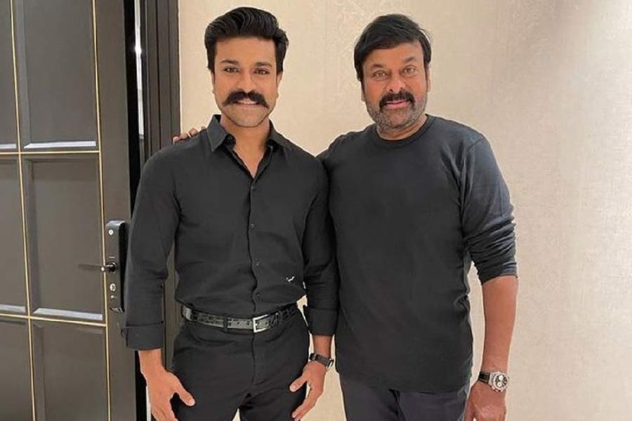 image of ramcharan and his father 