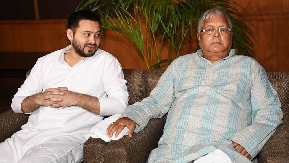 photo of Tejashwi Yadav and Lalu Prasad Yadav