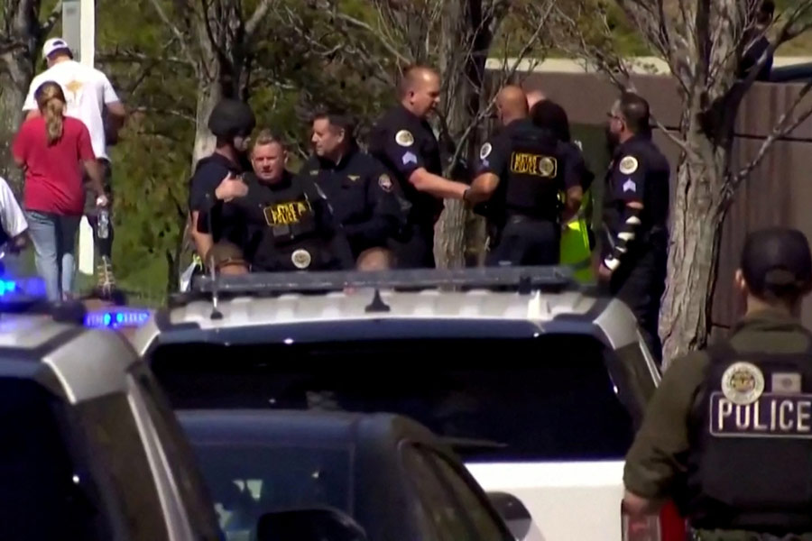 An image of Law enforcement officers in front of the School after a shooting in Nashville