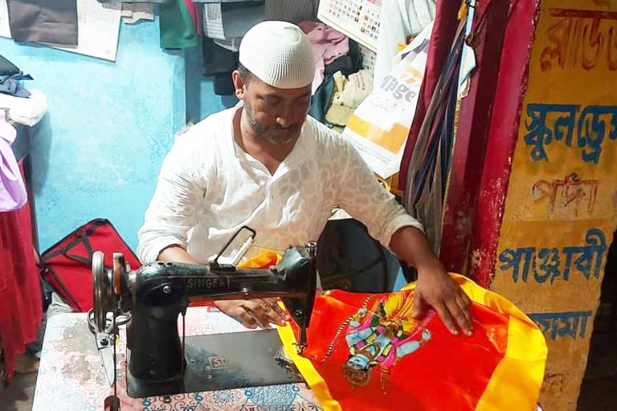 Muslim tailor stiches flags for Ram Navami in Midnapore.