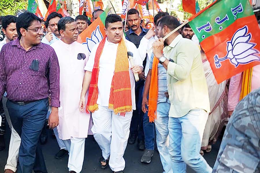 Suvendu Adhikari at his followers at a BJP rally