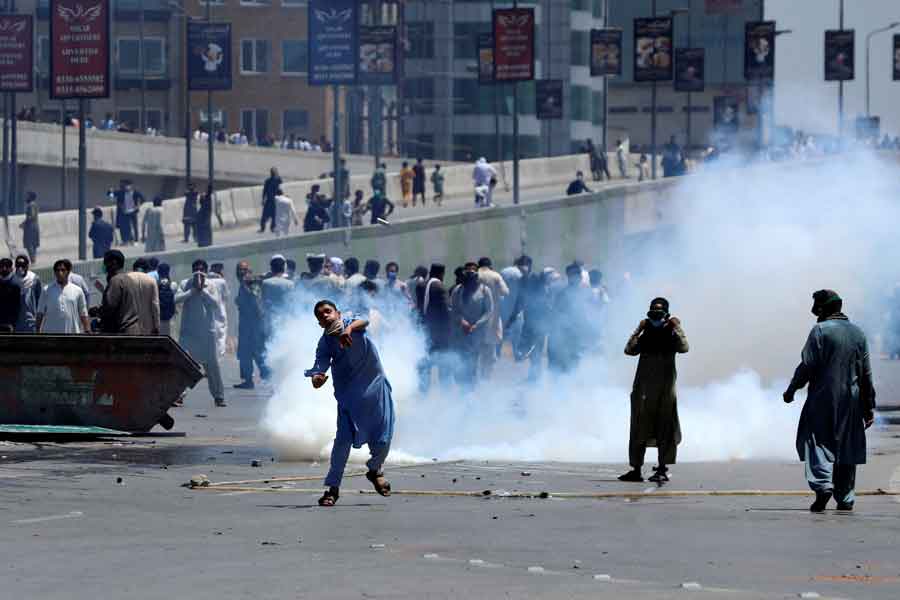 Image of PTI supporter pelting stone