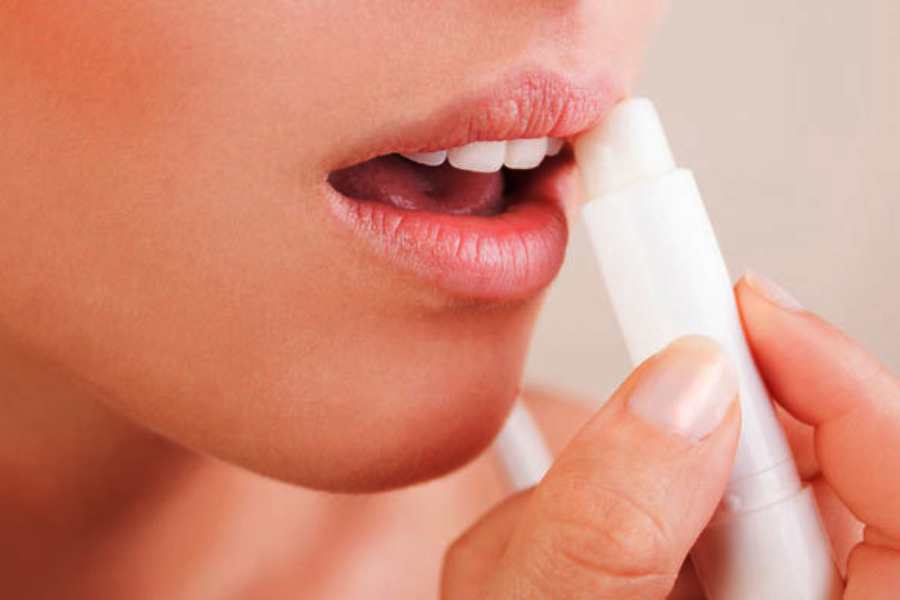 Image of using Lipbalm