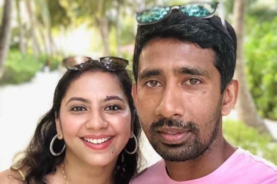 Wriddhiman Saha and His Wife.