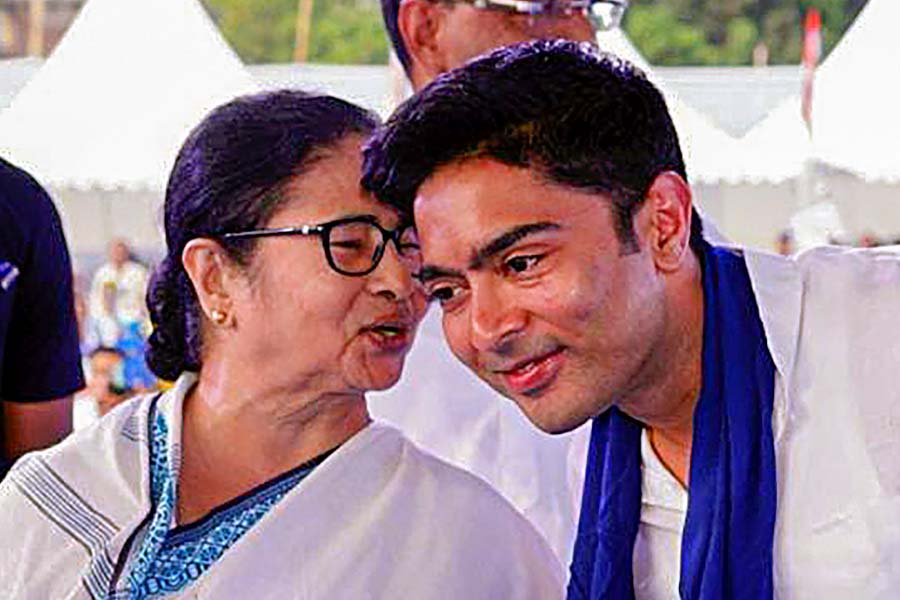 Image of Abhishek Banerjee And Mamata Banerjee.