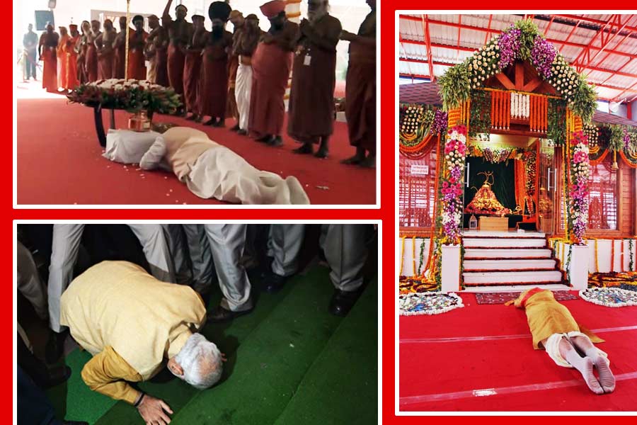 PM Narendra Modi touches New Parliament building ground laying on the floor.