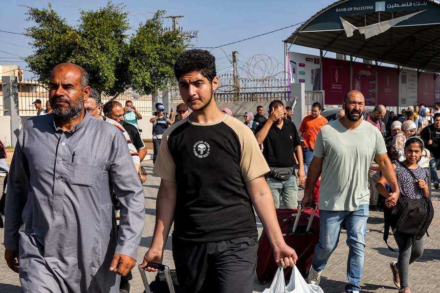 First foreigners leave Gaza for Egypt though Rafah crossing