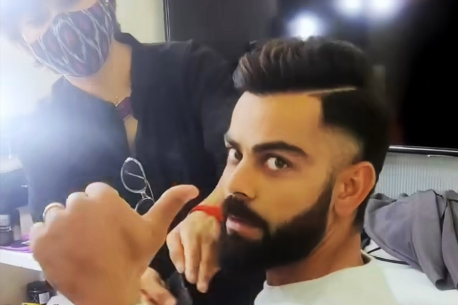 How much Virat Kohli spend on hair cutting and who does it