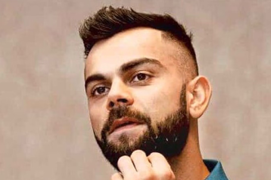 How much Virat Kohli spend on hair cutting and who does it