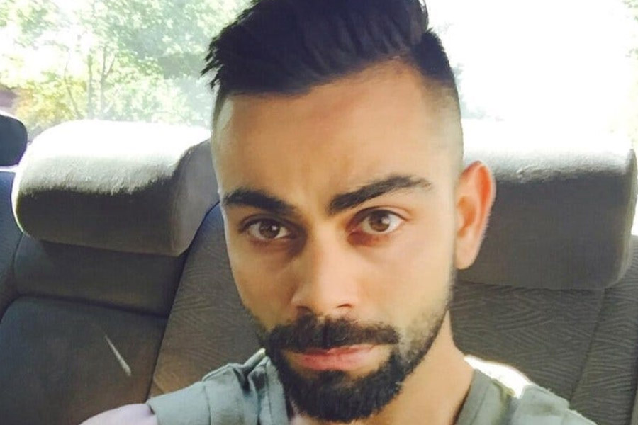 How much Virat Kohli spend on hair cutting and who does it