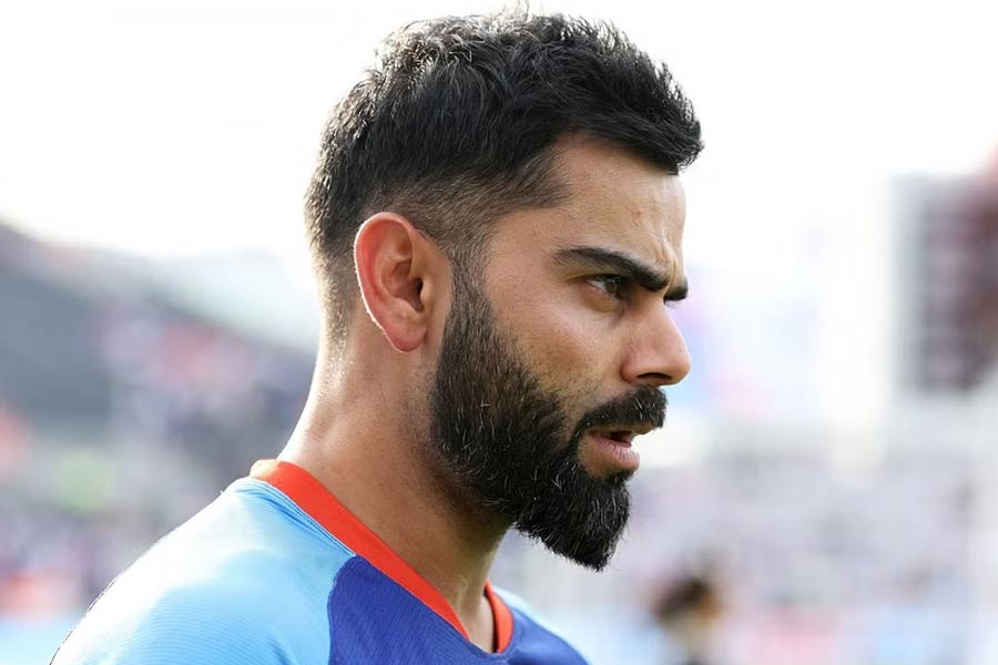 How much Virat Kohli spend on hair cutting and who does it